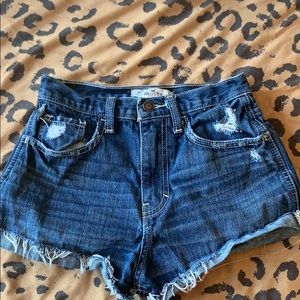 Distressed denim shorts
